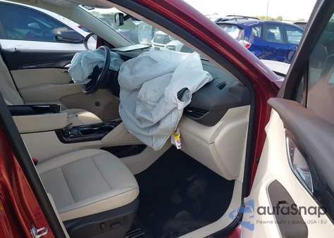 2023 Buick Envision Essence Awd from USA, damaged, VIN LRBFZPR4XPD204904